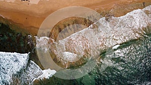 Aerial view to tropical sandy beach and blue ocean