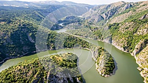 Aerial view to viewpoint Vidikovac Molitva, with curved meanders in canyon of Uvac river, Serbia photo