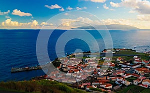 Aerial view to Vila do Corvo and Flores island at sunset, Corvo island, Azores, Portugal