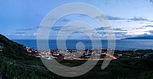 Aerial view to Vila do Corvo and Flores island at sunset, Corvo island, Azores, Portugal