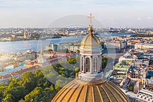 Aerial view top with colonnade cross of St Isaac`s Cathedral, background the Admiralty, Peter and Paul Fortress, the Winter Palac