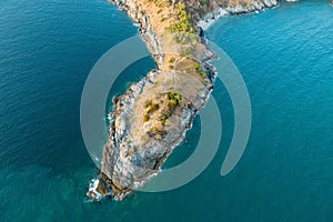 Aerial view top down drone shot of laem promthep cape Beautiful scenery andaman sea surface in summer season at Phuket island