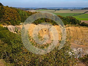 Aerial view of  the top of the hill Rother Kopf` over a quarry in Muellenborn, Eifel`
