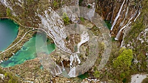 Aerial view top shooting from above beautiful waterfalls mountains nature of Croatian National Park Plitvice Lakes in