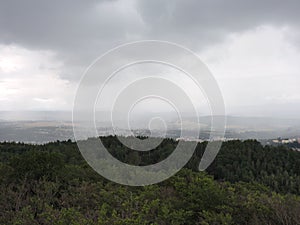 Aerial view of top of trees and cloudy sky, Karlovy Vary, Czech Republic