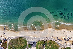 Aerial view. Top view of amazing nature background - azure sea and white sand. Clor of the water are beautifully bright. Azure