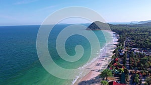 Aerial view top view Beautiful topical beach with white sand coconut palm trees and sea. Top view empty and coconut tree shadow