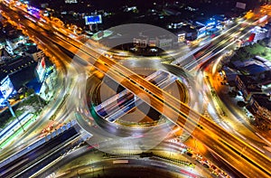 Aerial view and top view of traffic on city streets in Bangkok , Thailand. Expressway with car lots. Beautiful roundabout road in