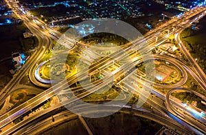 Aerial view and top view of traffic on city streets in Bangkok , Thailand. Expressway with car lots. Beautiful roundabout road in