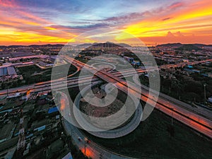 Aerial view and top view of traffic on city streets in Bangkok , Thailand. Expressway with car lots. Beautiful roundabout road in