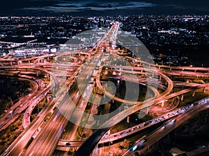 Aerial view and top view of traffic on city streets in Bangkok , Thailand. Expressway with car lots. Beautiful roundabout road in