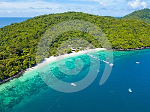 Aerial view or top view of tropical island beach with clear water at Banana beach, Coral Island, Koh Hey, Phuket