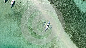 Aerial view of tourist Filipino boats moored at sandbar. Snake Island, Bacuit Bay, El Nido, Palawan, Philippines