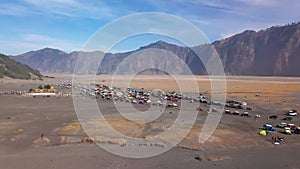 Aerial view of tourist jeeps at parking area, Bromo volcano, Indonesia