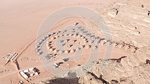 Aerial view of touristic bedouin camp in Wadi Rum mountains.