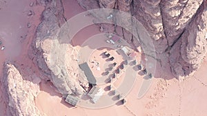 Aerial view of touristic bedouin camp in Wadi Rum mountains.