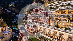 Aerial view of the touristic city, the mountains and the beach, hotels and restaurants, buildings, business tours, sea holidays,