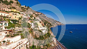 Aerial view of the touristic city, the mountains and the beach, hotels and restaurants, buildings, business tours, sea holidays,