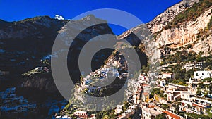 Aerial view of the touristic city, the mountains and the beach, hotels and restaurants, buildings, business tours, sea holidays,