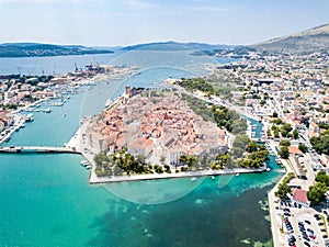 Aerial view of touristic old Trogir, historic town on a small island and harbour on the Adriatic coast in Split-Dalmatia, Croatia.