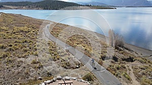 Aerial view of tourists cycling on a trail around Lake Dillon in Dillon, Colorado