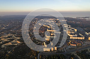 Aerial view of town in autumn at sunset.