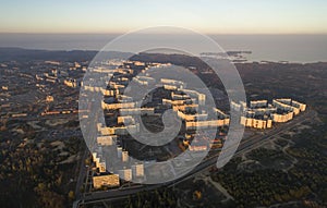 Aerial view of town in autumn at sunset.