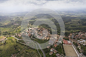 aerial view of the town of gambassi terme on the tuscan hills photo