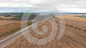 Aerial view on tracks between agriculture fields