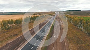 Aerial view on tracks between agriculture fields