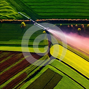 Aerial View of Tractor Spraying Pesticides on Green Soybean Plantation at Sun - Drone View. Generative ai