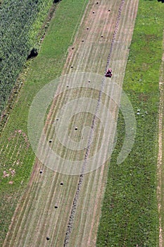 An aerial view of tractor working in a field