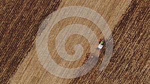 Aerial view of tractor working on a field.