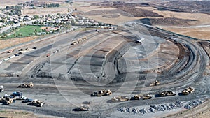 Aerial View Of Tractors On A Housing Development Construction Site