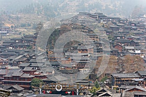 Aerial view of traditional wooden building cluster of Xijiang Qianhu Miao Village The One Thousand Household Miao Village ,  in