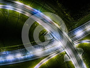 Aerial view of the traffic intersection outside the city at night