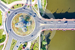 Aerial view of a traffic roundabout in GorzÃ³w Wielkopolski town city at river Warta in Poland