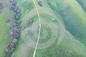 Aerial View of Trail and Green Hills in California