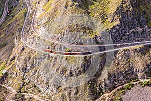 Aerial View Of A Train Which Circling The Mountain