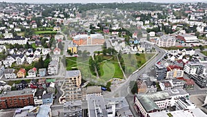 Aerial View of Tromso, Norway. City Residential Neighborhood and School 60fps
