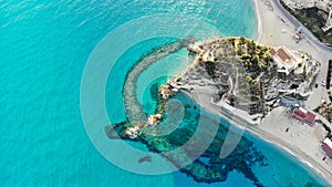 Aerial view in Tropea Italian town in Calabria with the Breakwaters in front of Santa Maria dell Isola Monastery photo
