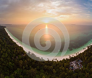Aerial view tropical beach island reef caribbean sea dramatic sky at sunset sunrise. Indonesia Moluccas archipelago, Kei Islands,