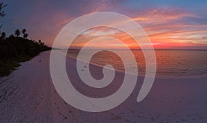 Aerial view tropical beach island reef caribbean sea dramatic sky at sunset sunrise. Indonesia Moluccas archipelago, Kei Islands,