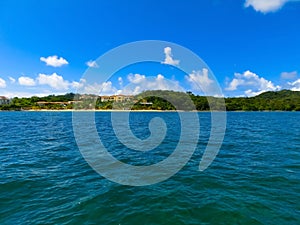 An aerial view of a tropical beach in Roatan Honduras