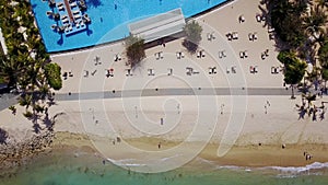 Aerial view of tropical beach with swimming pool
