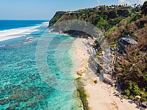 Aerial view of tropical beach with turquoise ocean in Bali