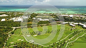 Aerial view of tropical Caribbean beach resort and golf course. Punta Cana