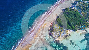 Aerial view of tropical island at Glover`s Reef Atoll in Belize