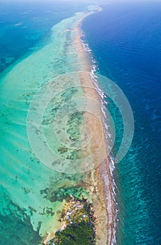 Aerial view of tropical island at Glover`s Reef Atoll in Belize