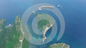 Aerial view of tropical island washed by ocean, Atuh beach. Nusa Penida, Bali